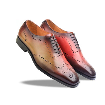 Tan Wholecut Laceups Hand Patina
